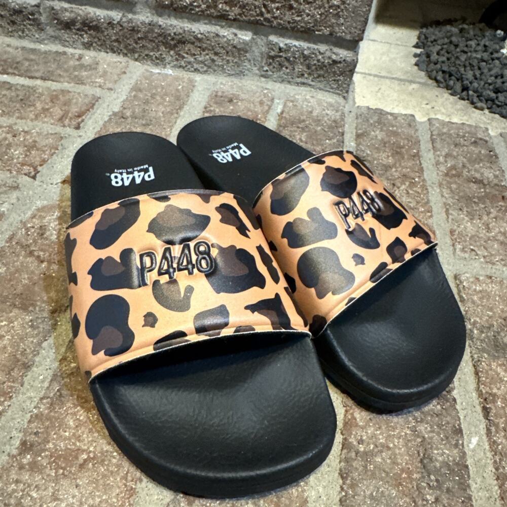 P448‎ Leopard black sandals Slides Size 4 Black logo flats Animal Print